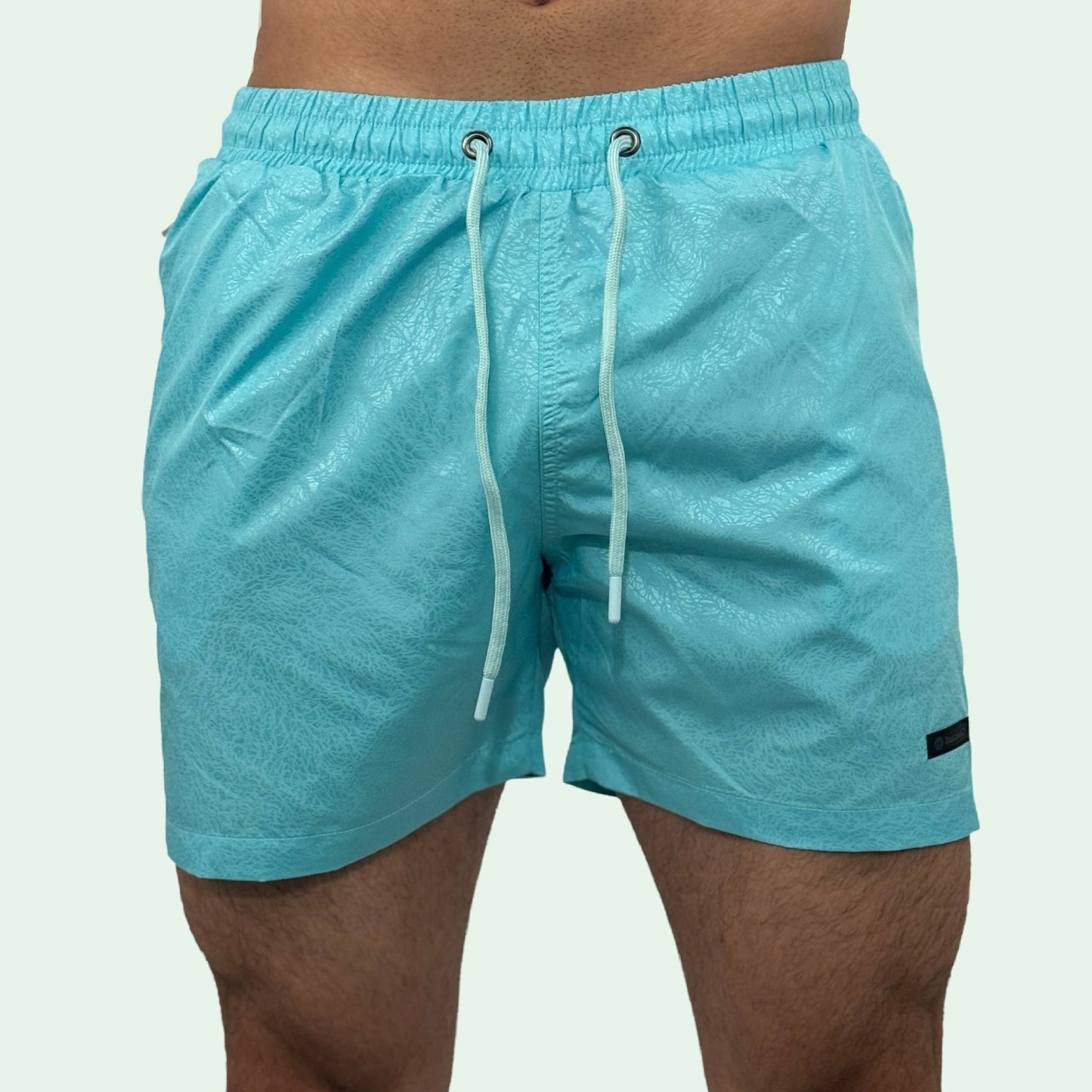 TEXTURED SWIMMING TRUNKS